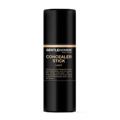 Gentlehomme concealer stick features a built-in brush for smooth blending.