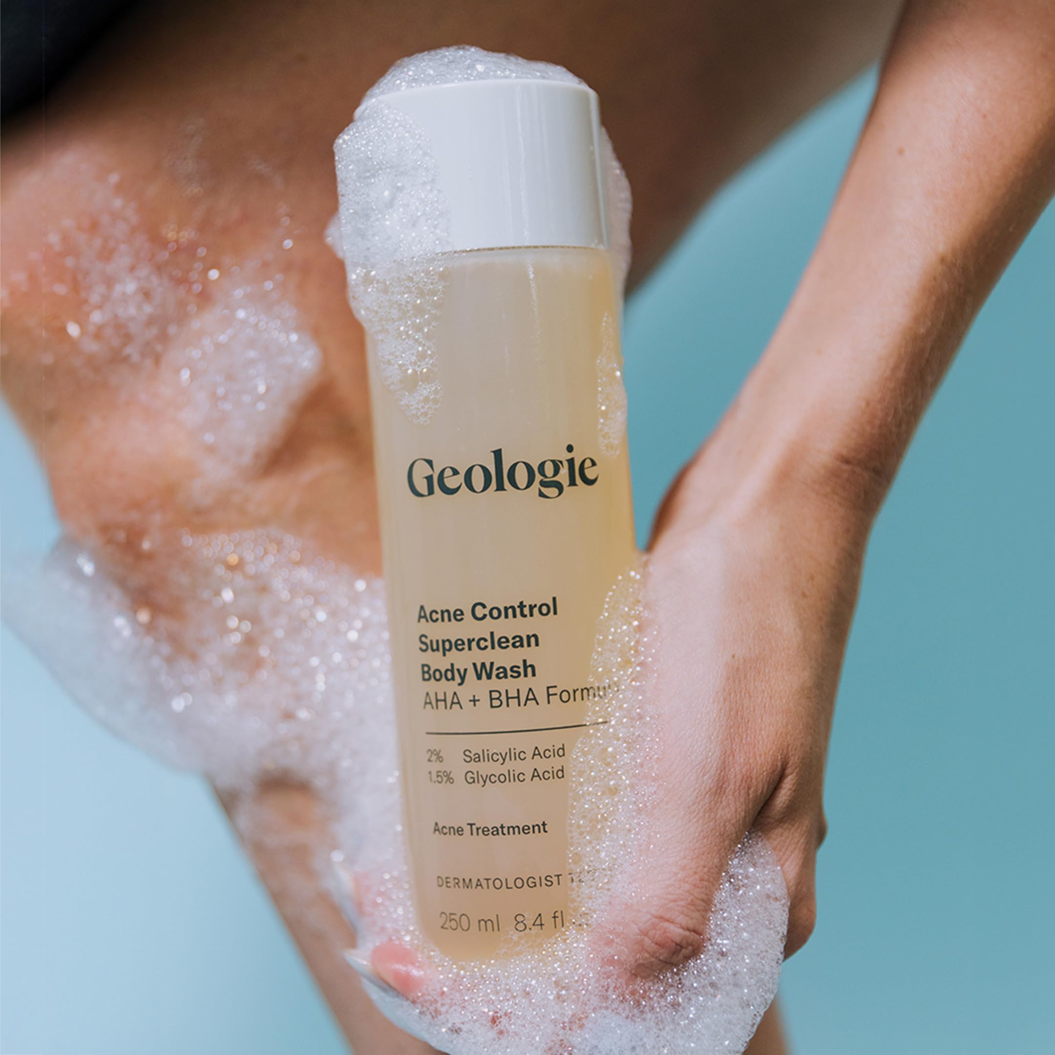 Geologie Acne Control Body Wash hand application shows easy distribution over skin.