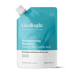 Geologie Strengthening Shampoo bottle pour for easy application and hydration.