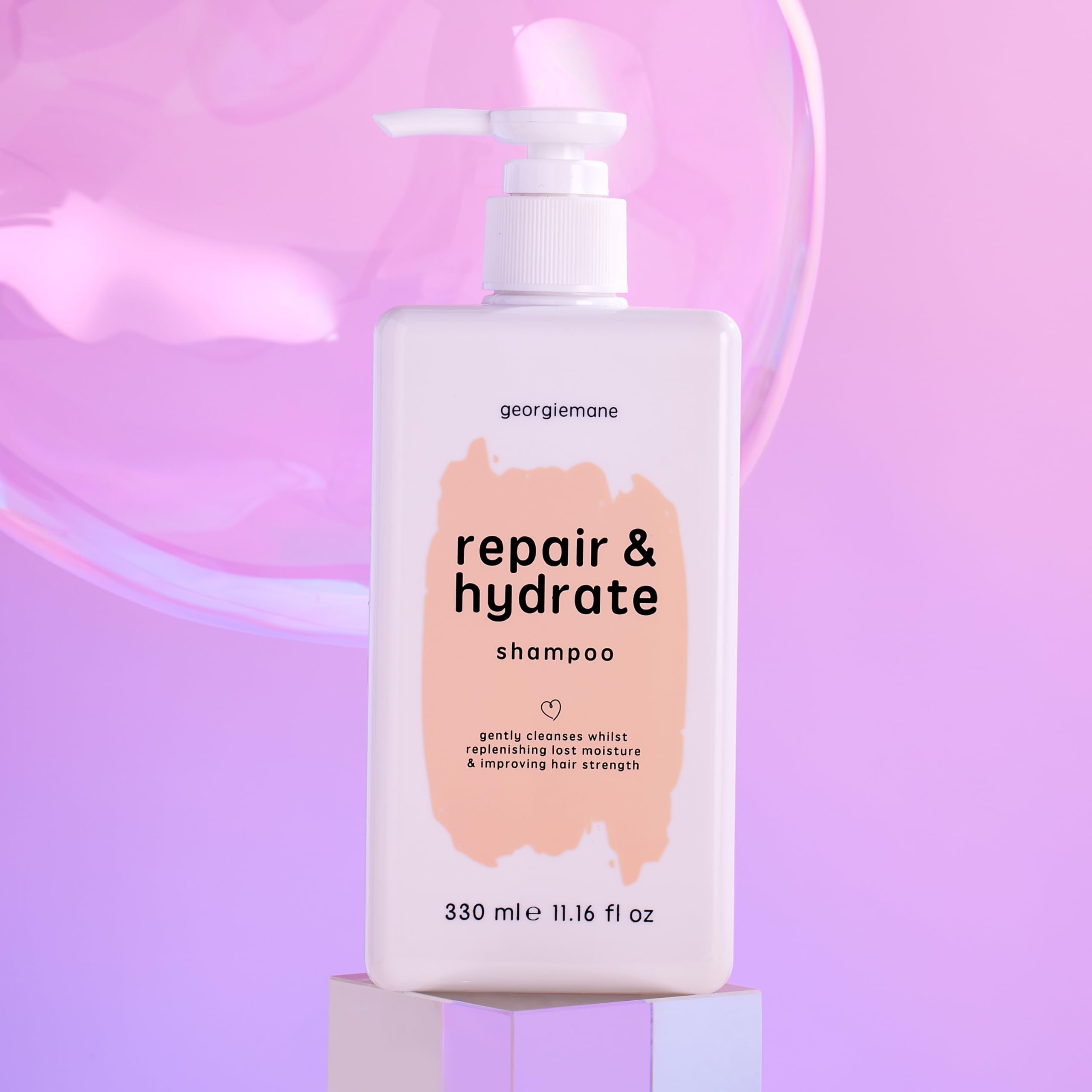 Georgiemane Repair and Hydrate Shampoo lathering action suggests gentle cleansing.