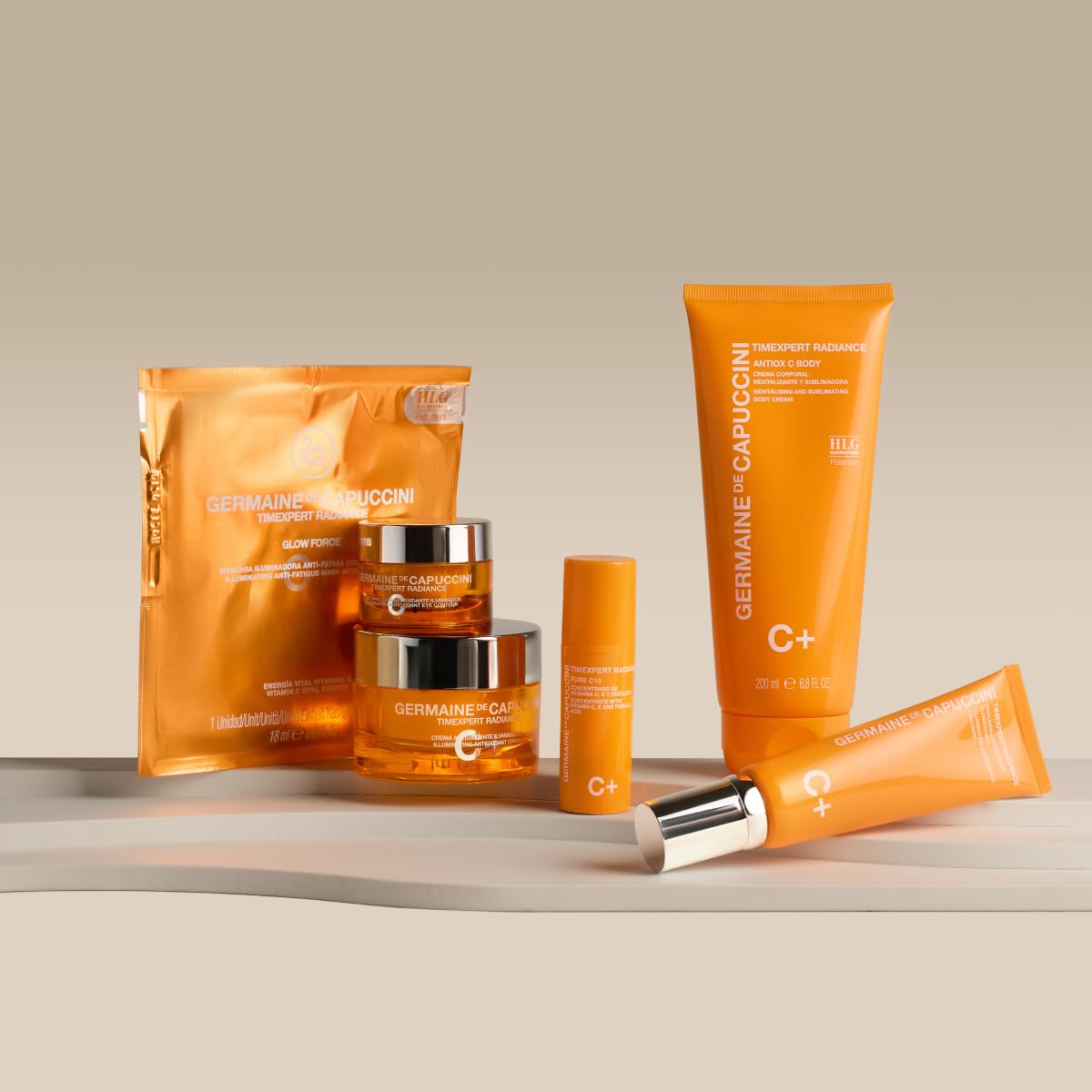 Vitamin C and orange-tinted texture visual emphasizes antioxidant benefits for skin vitality.
