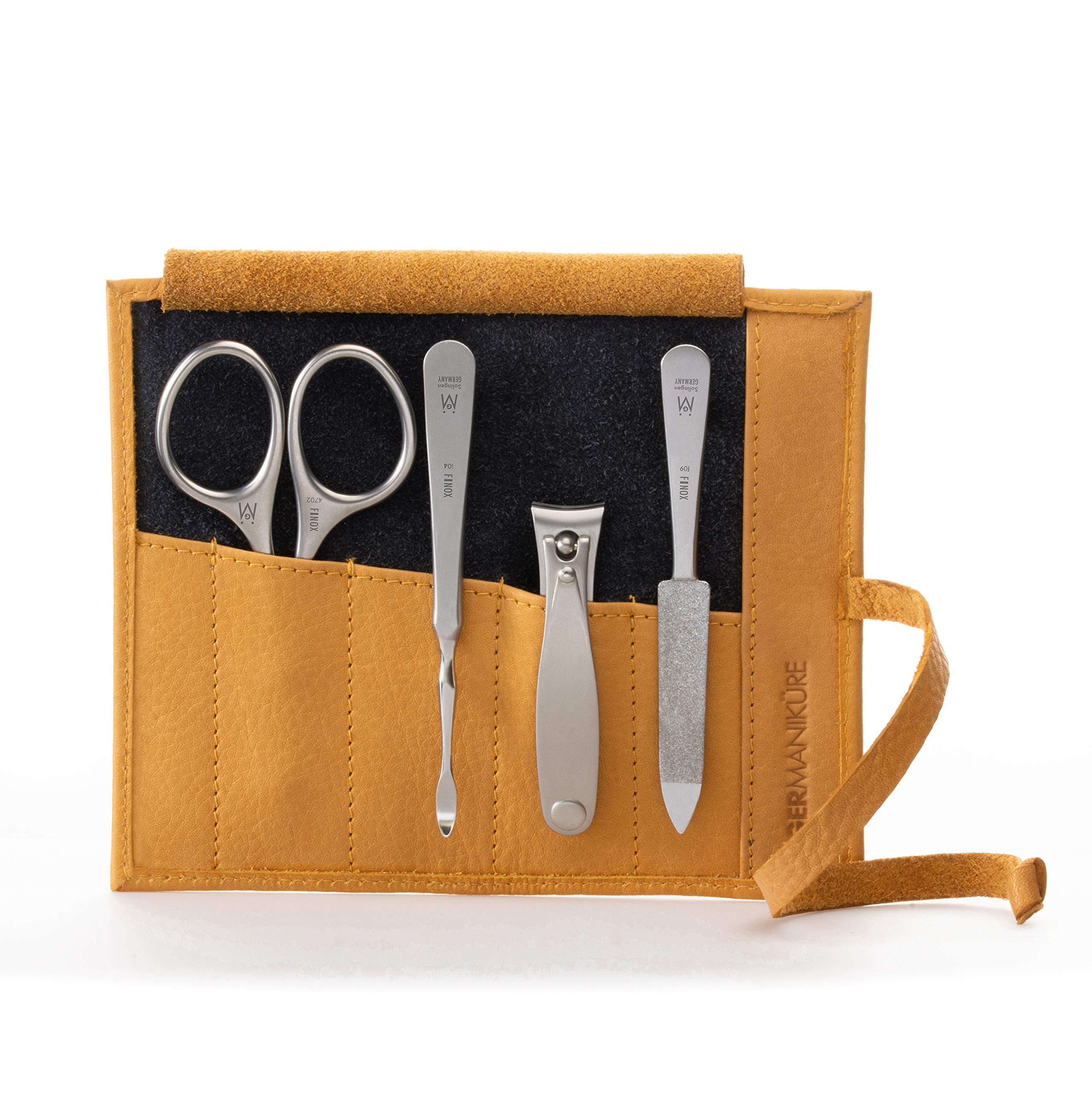 GERMANIKURE 4pc manicure set in yellow case ready for on-the-go grooming.