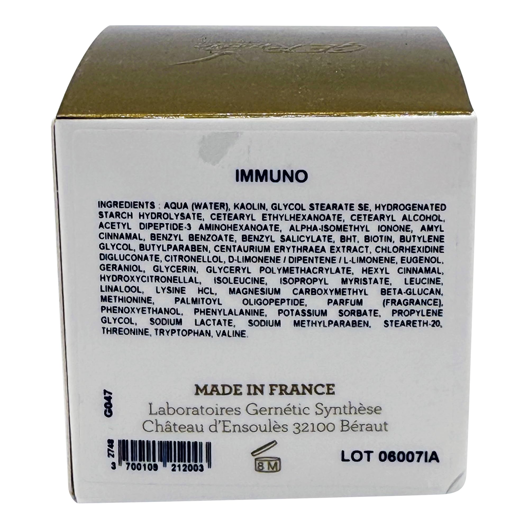 Gernetic Immuno Restructuring Face Mask application demonstrates smooth cream for revitalizing dull complexions.