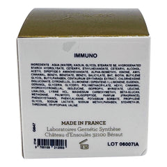 Gernetic Immuno Restructuring Face Mask application demonstrates smooth cream for revitalizing dull complexions.