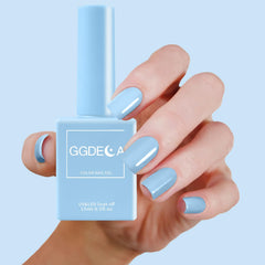 GGDECA light blue gel polish swatch highlights milky pastel tone on nails.