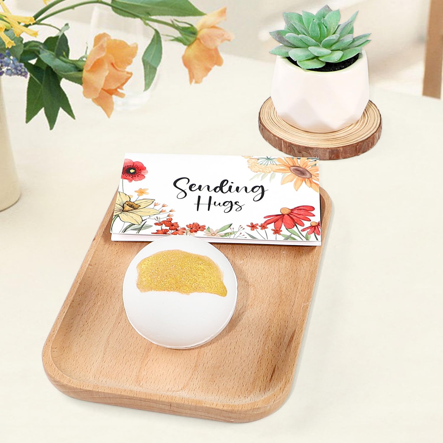 GiftPeak Sympathy Basket bath bombs create a soothing self-care moment.