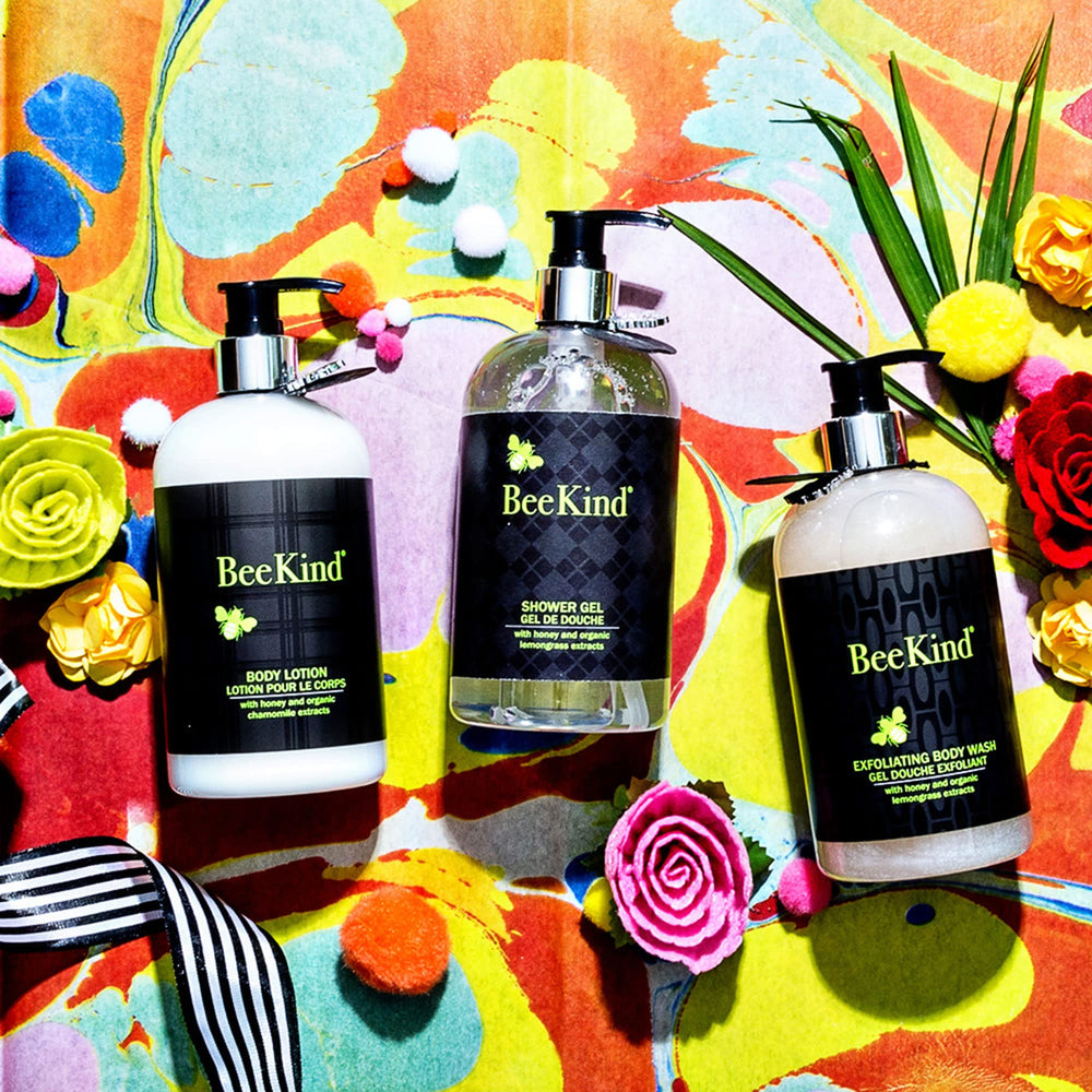 BeeKind lotion being applied to hands demonstrates versatile body care.