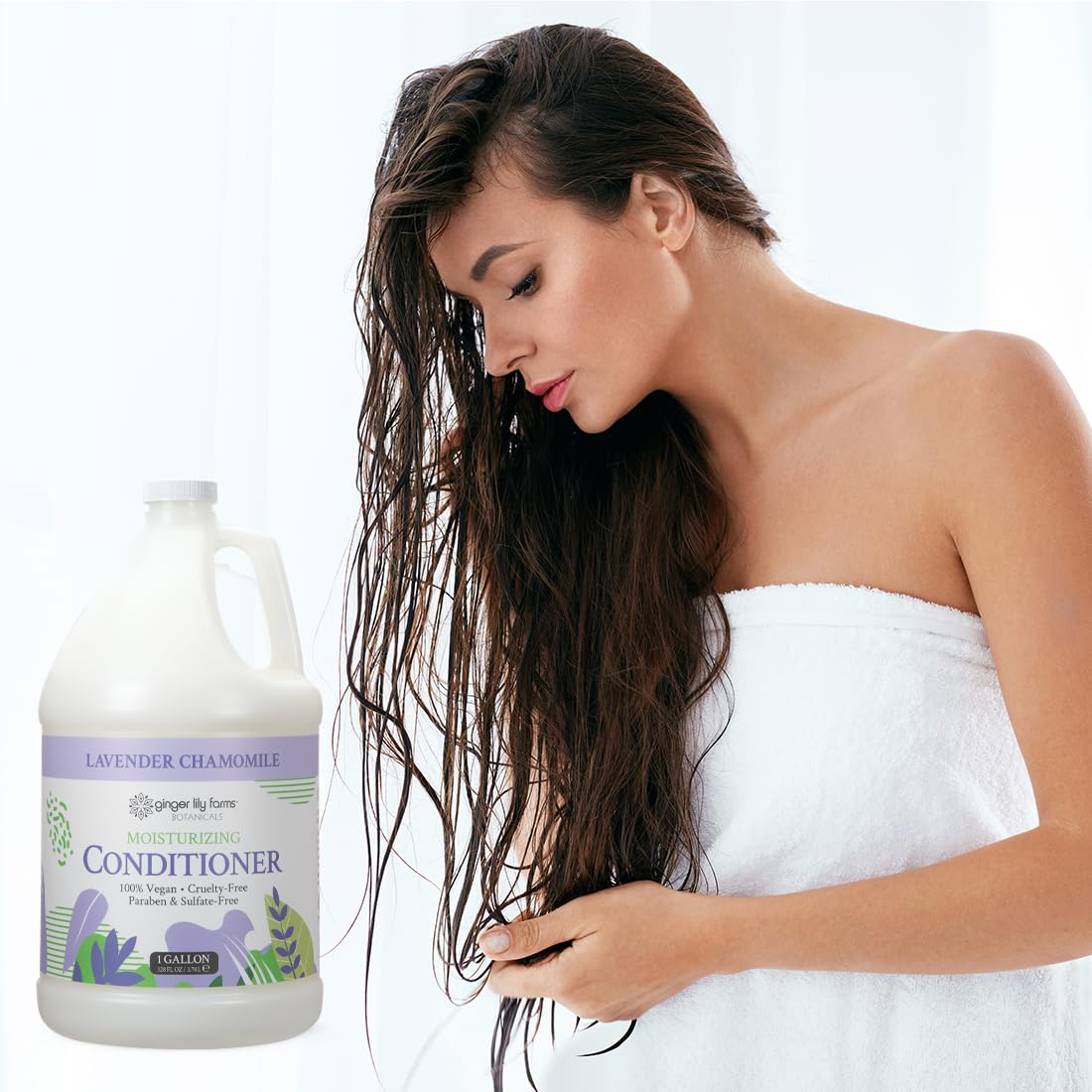 Ginger Lily Farms Botanicals conditioner shown in locker room dispenser setup.