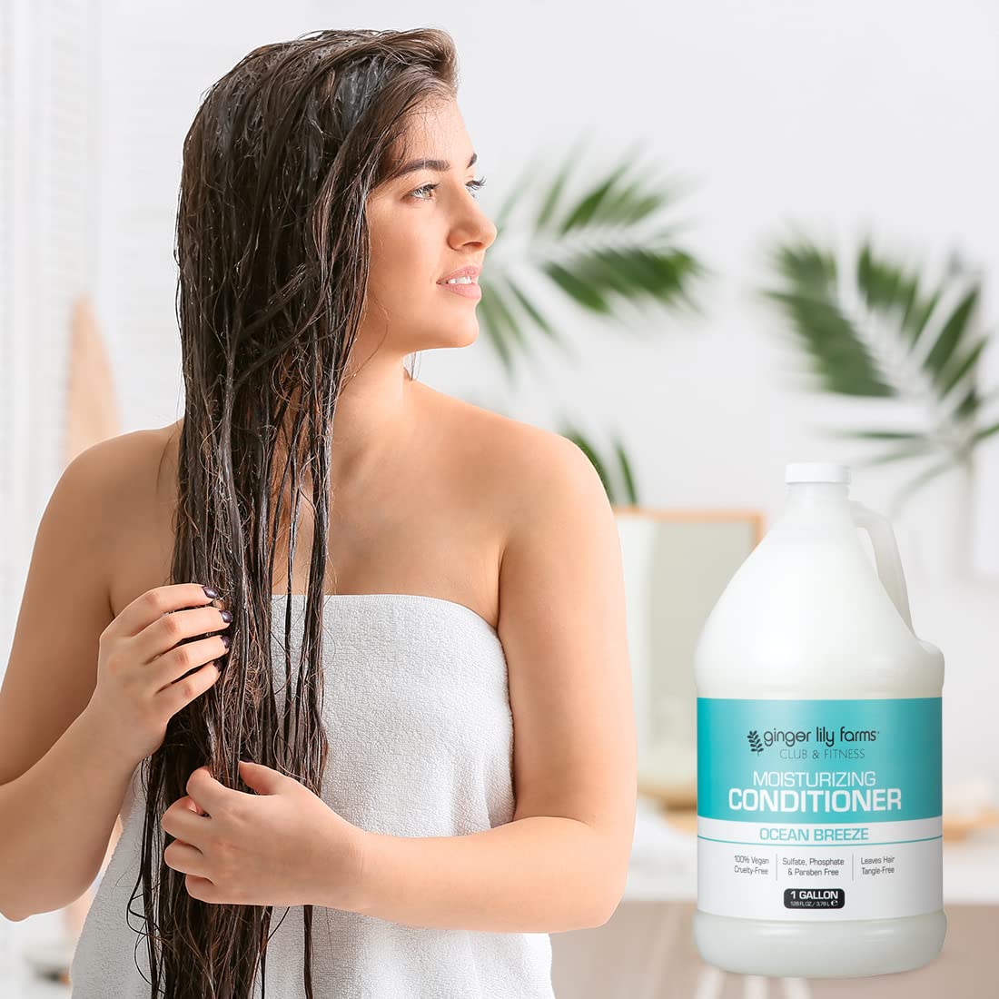 Ginger Lily Farms Club & Fitness Ocean Breeze conditioner on a bathroom shelf.