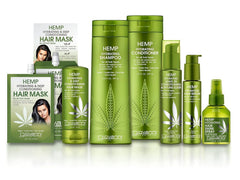 Hands applying GIOVANNI Hemp Hydrating Hair Serum to hair mid-lengths and ends