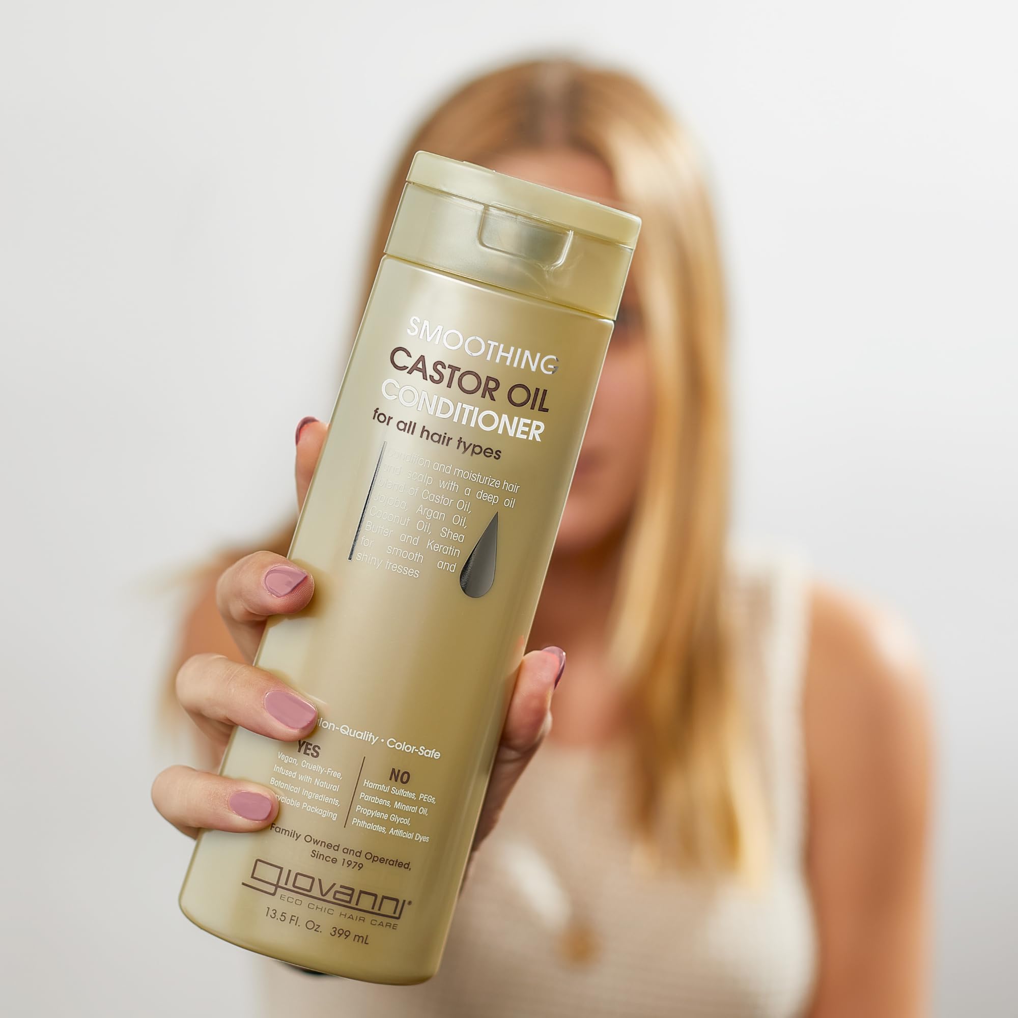 Hair after Giovanni conditioner showing smoother texture and reduced frizz
