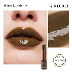 Close-up of GIRLCULT lipstick cap and sleek packaging.
