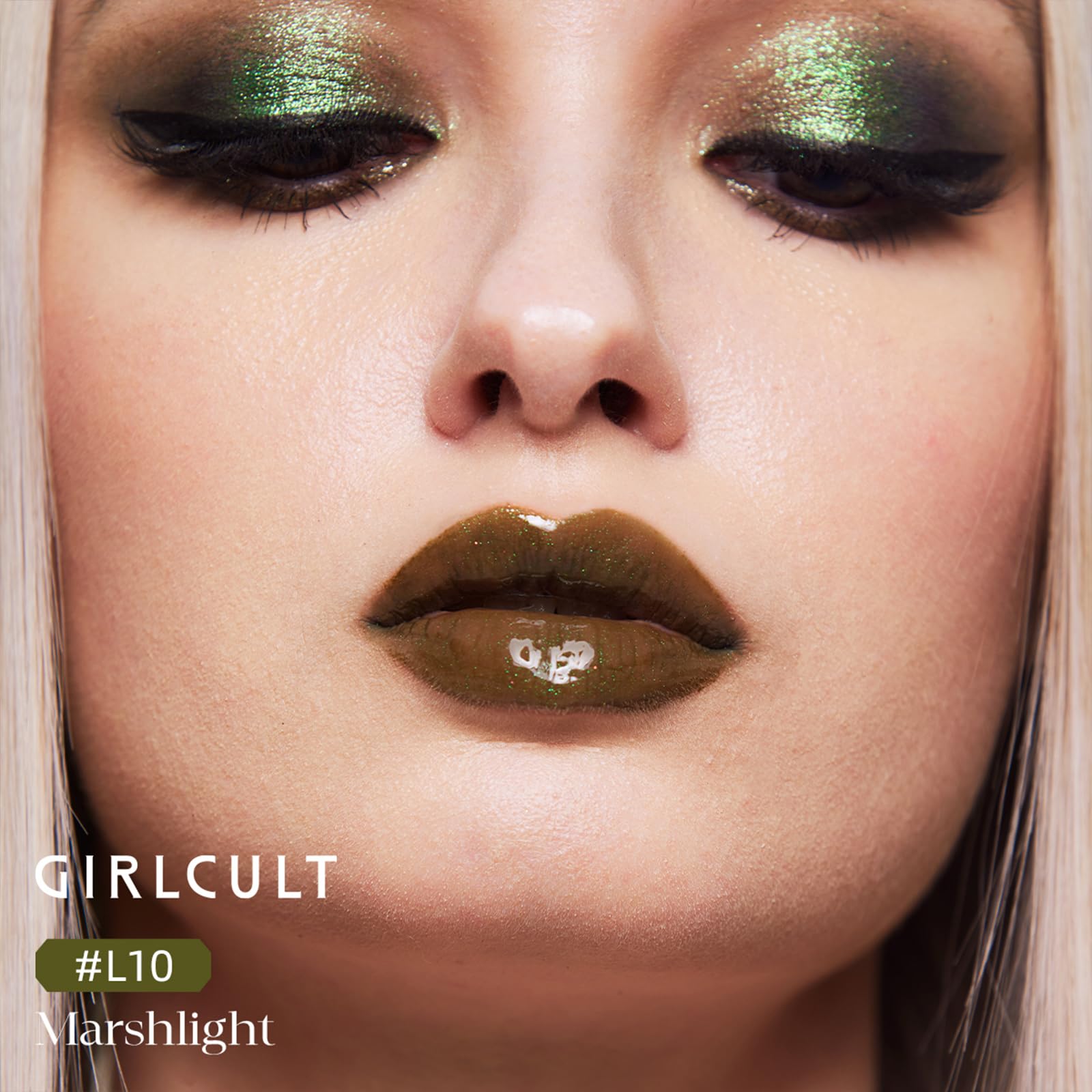 GIRLCULT gloss lipstick swatch displaying luminous shine on skin.