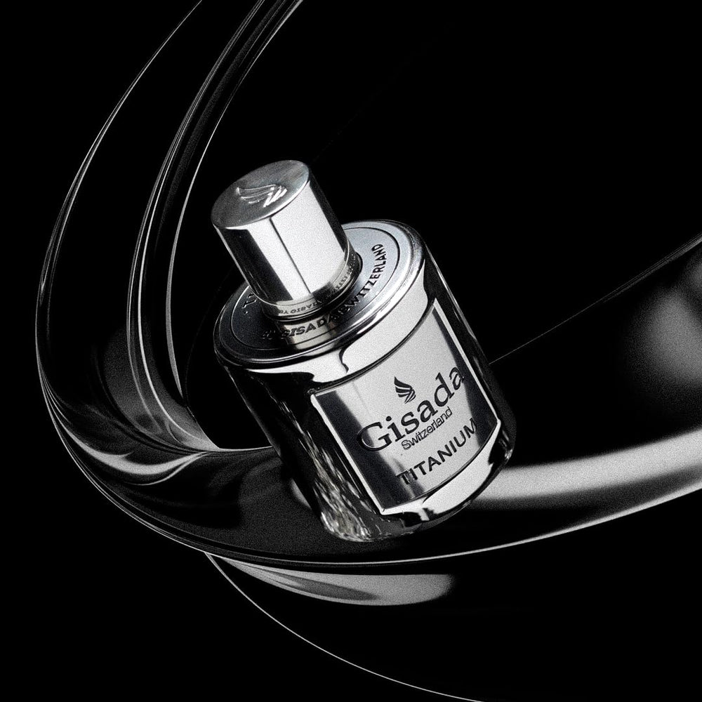 Gisada Titanium base notes sandalwood and amber provide lasting depth.