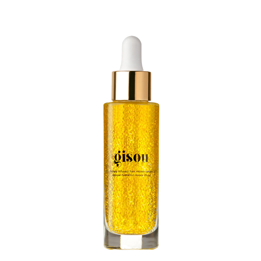 Gisou Honey Infused Hair Repair Serum packaging pump for precise application and no mess.