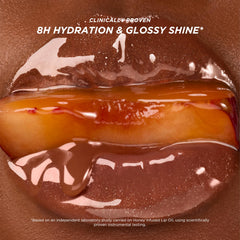 Gisou Honey Infused Lip Oil application brush enables precise, mess-free application.
