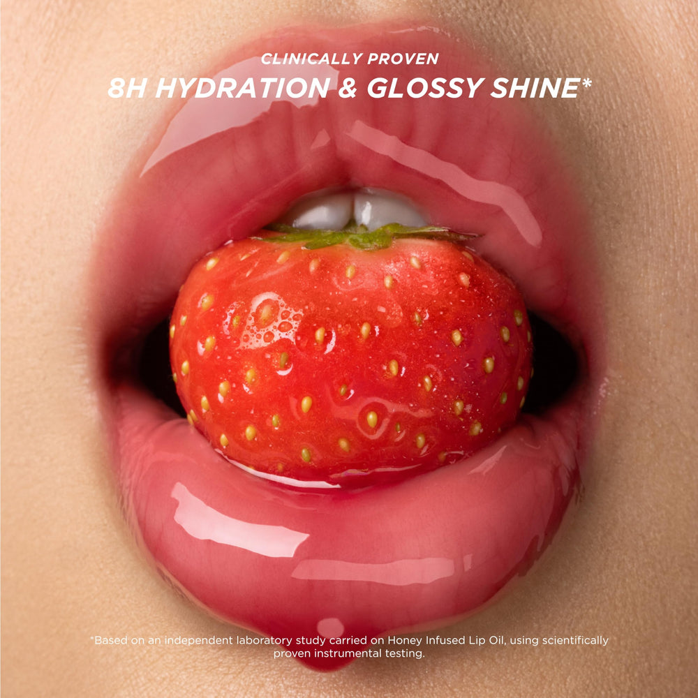 Gisou Honey Infused Lip Oil close-up emphasizes a high-gloss finish.