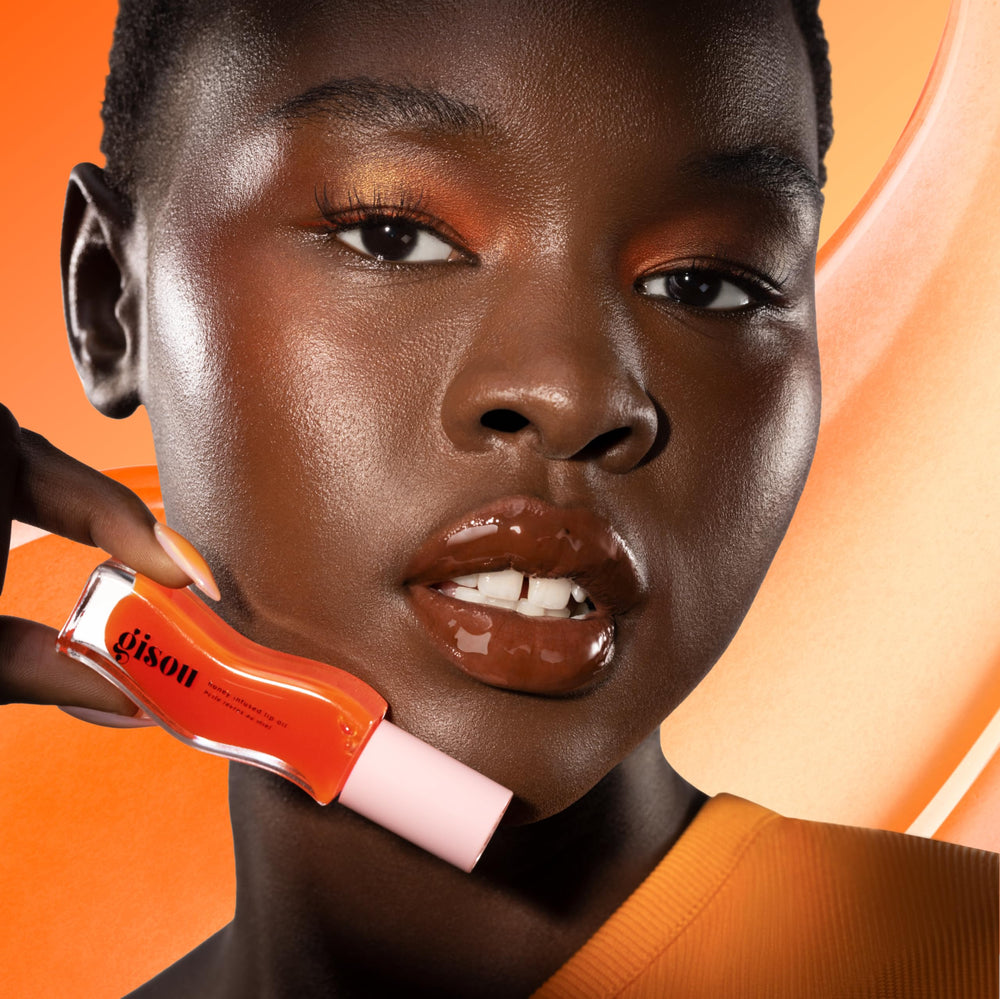 Gisou lip oil jojoba oil blend detail for lasting moisture.