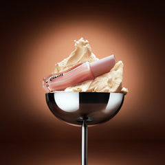 Gisou Honey Infused Lip Oil Mango Passion Punch swatch – smooth application with non-sticky shine.