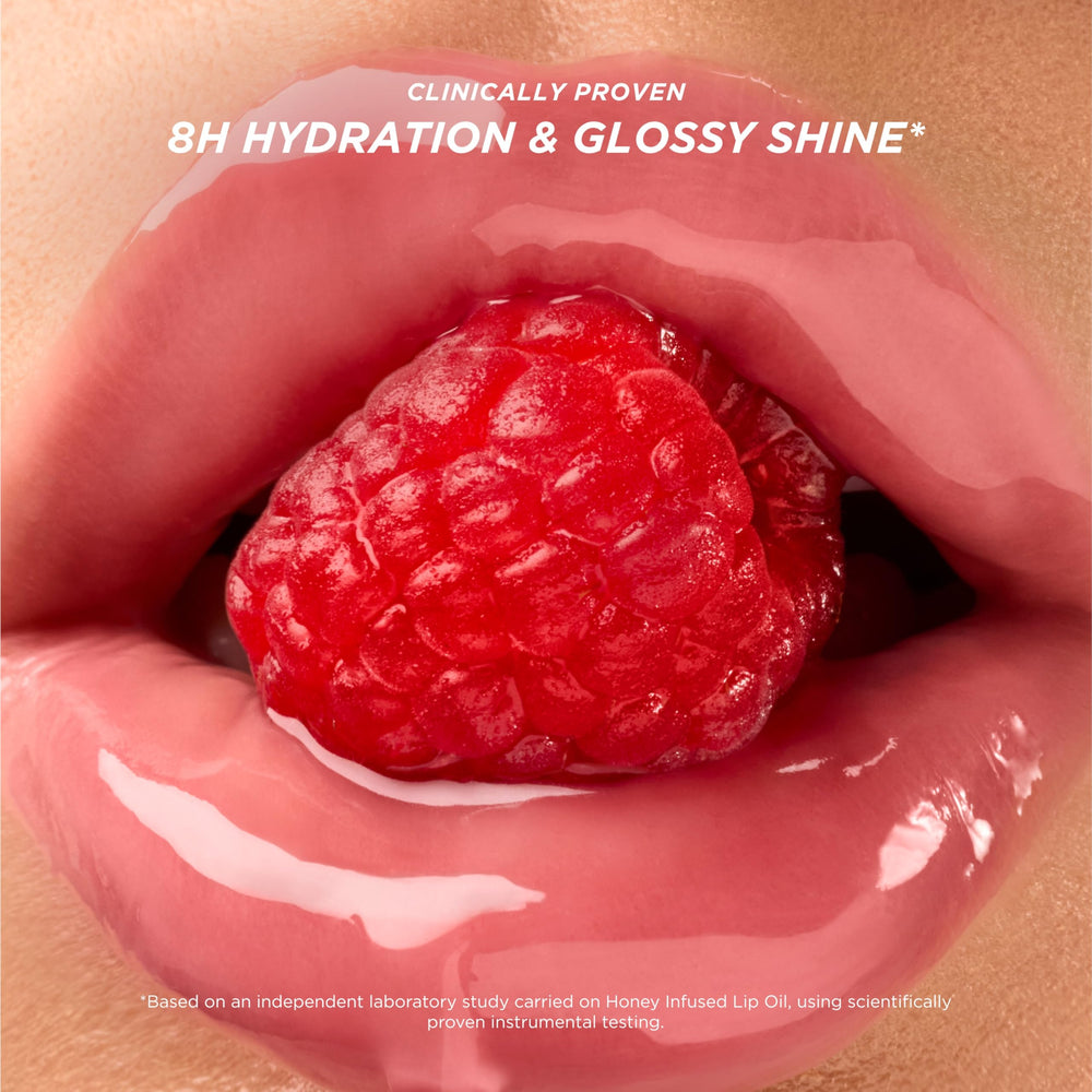 Gisou Raspberry Swirl lip oil adds a glossy finish.