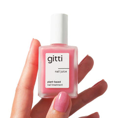 Gitti Nail Juice bottle close-up shows natural ingredients and vegan formula for healthy nails.