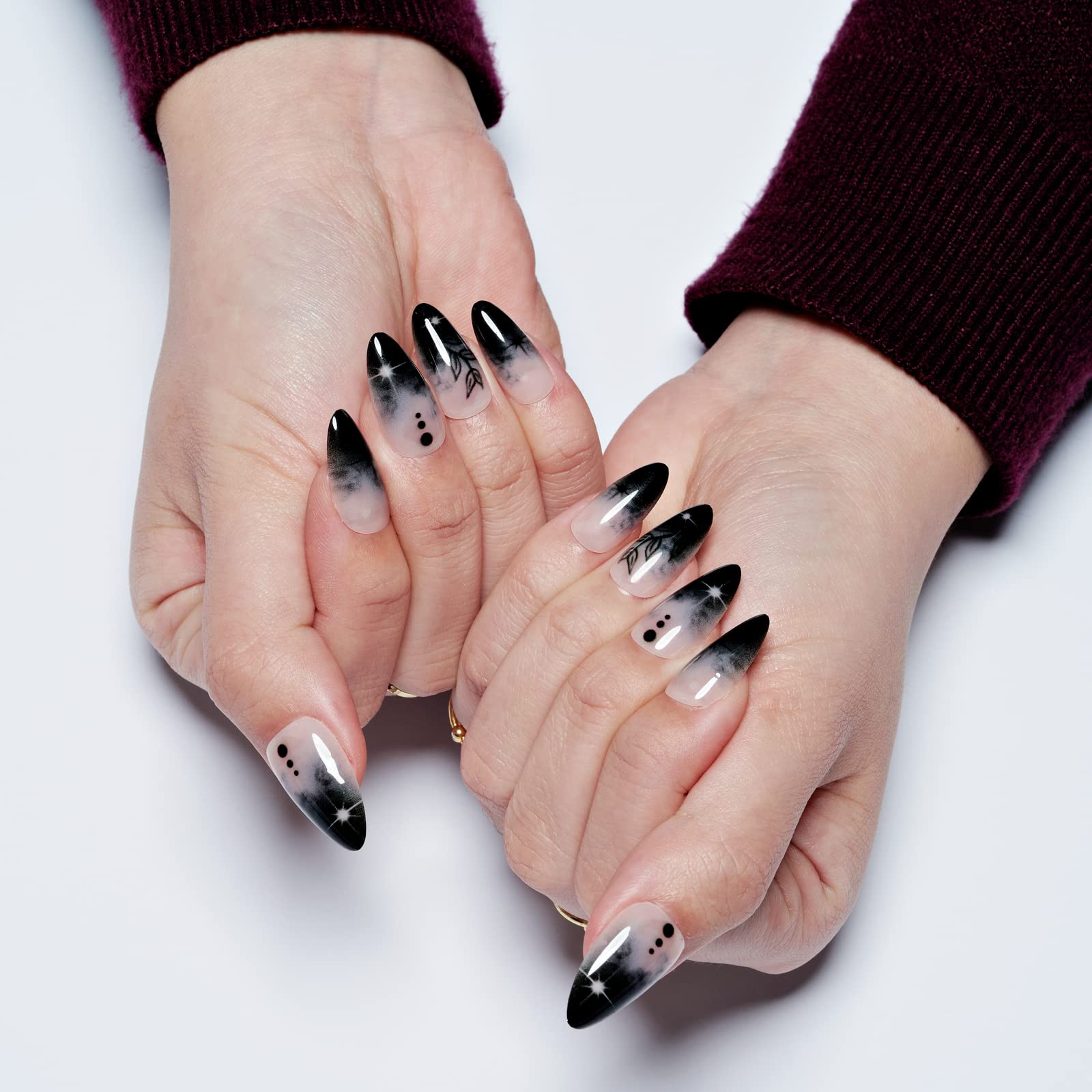 GlamerMaid medium almond nails close-up with smooth, glossy finish.
