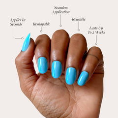 Glamnetic Azure Blue nails in glossy finish, durable for up to two weeks.