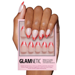 Glamnetic Mrs. Claus nails with Santa hat design for a festive manicure