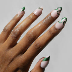 Glamnetic Parseltongue nails with chrome finish for bold style
