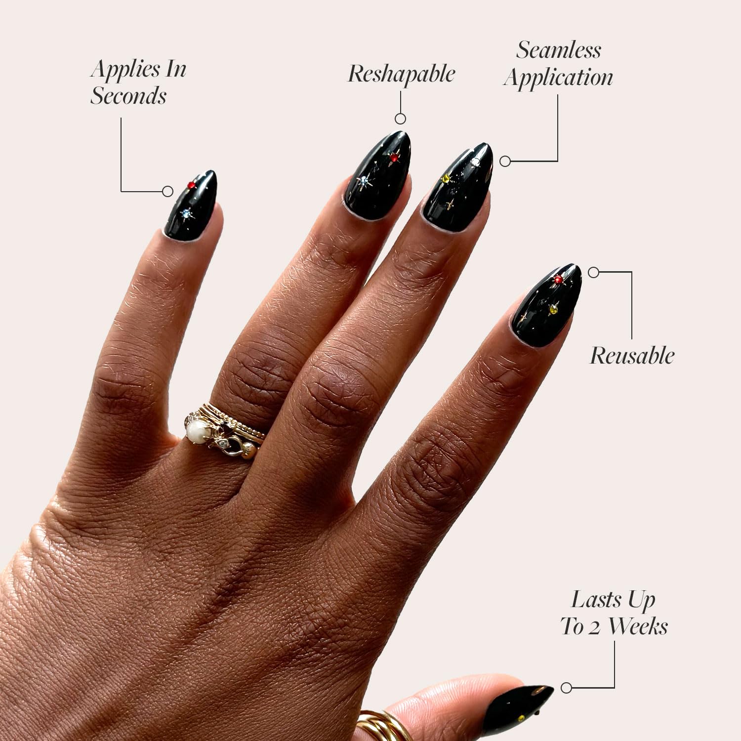 Glamnetic Winter Comet black nail gems highlight bold style and color punch.