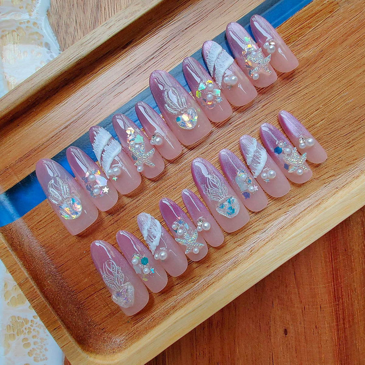 Gleamrain 3D handmade press-on nails in long almond shape offer durable wear.