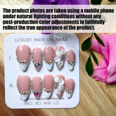Gleamrain almond nails featuring a floral 3D pattern for a standout manicure.