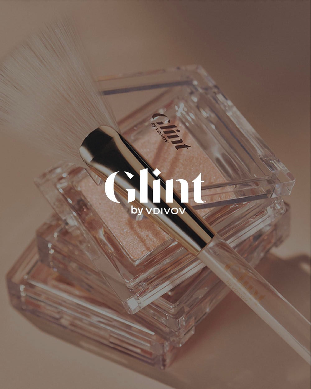 Glint compact close-up reveals micro-pearls and silky texture.