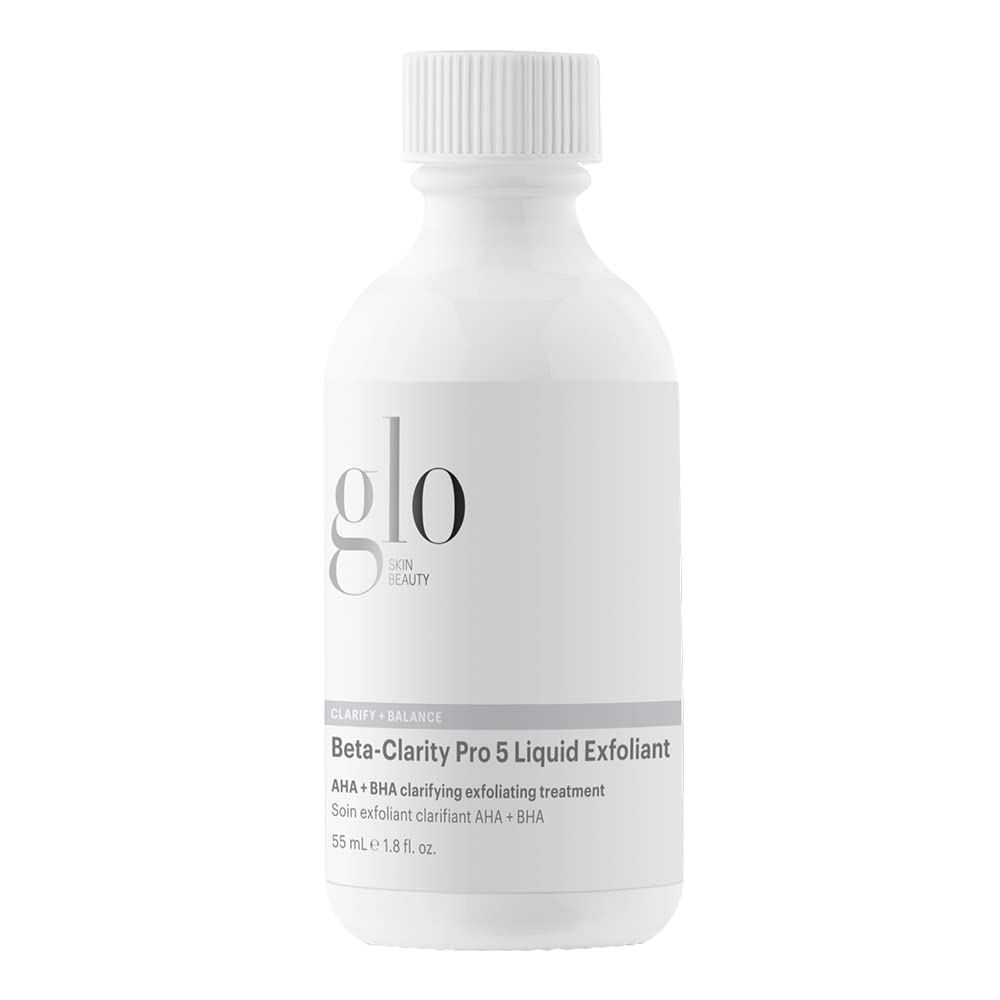 Glo Skin Beauty Beta-Clarity Pro 5 bottle on vanity, clarifying exfoliant for balanced skin.