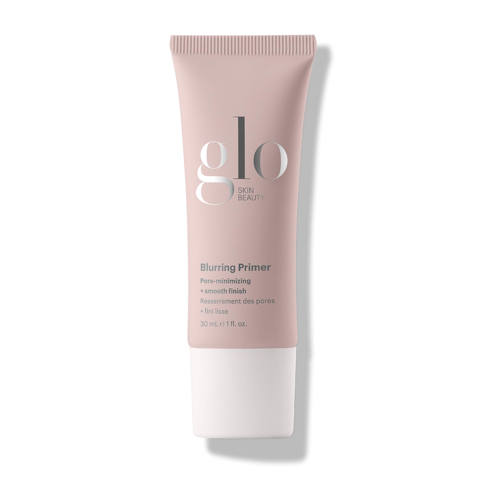 Glo Skin Beauty Blurring Primer with Ceramides bottle shows pore-minimizing prep for smoother makeup.