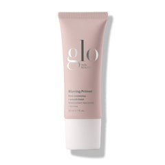 Glo Skin Beauty Blurring Primer with Ceramides bottle shows pore-minimizing prep for smoother makeup.