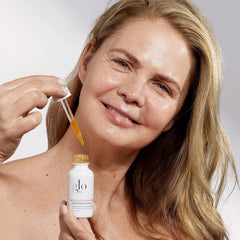 Glo Skin Beauty GlyPro Retinol Drops serum on face delivering smoothing and glow