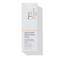 Glo Skin Beauty Hydra-Bright Alpha Arbutin Drops dropper releasing brightening serum.