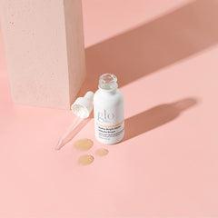 Glo Skin Beauty Hydra-Bright Drops texture close-up showing smooth serum.