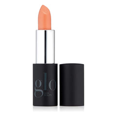 Glo Skin Beauty Lipstick Dune warm nude cap closed for travel-friendly use.