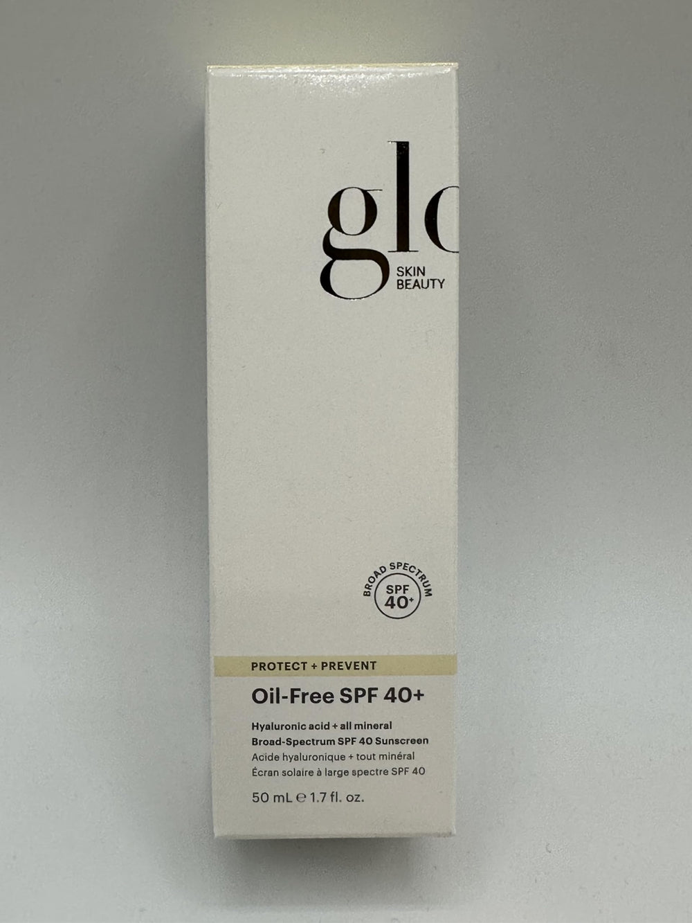 Glo Skin Beauty product beside other skincare items for seamless routine