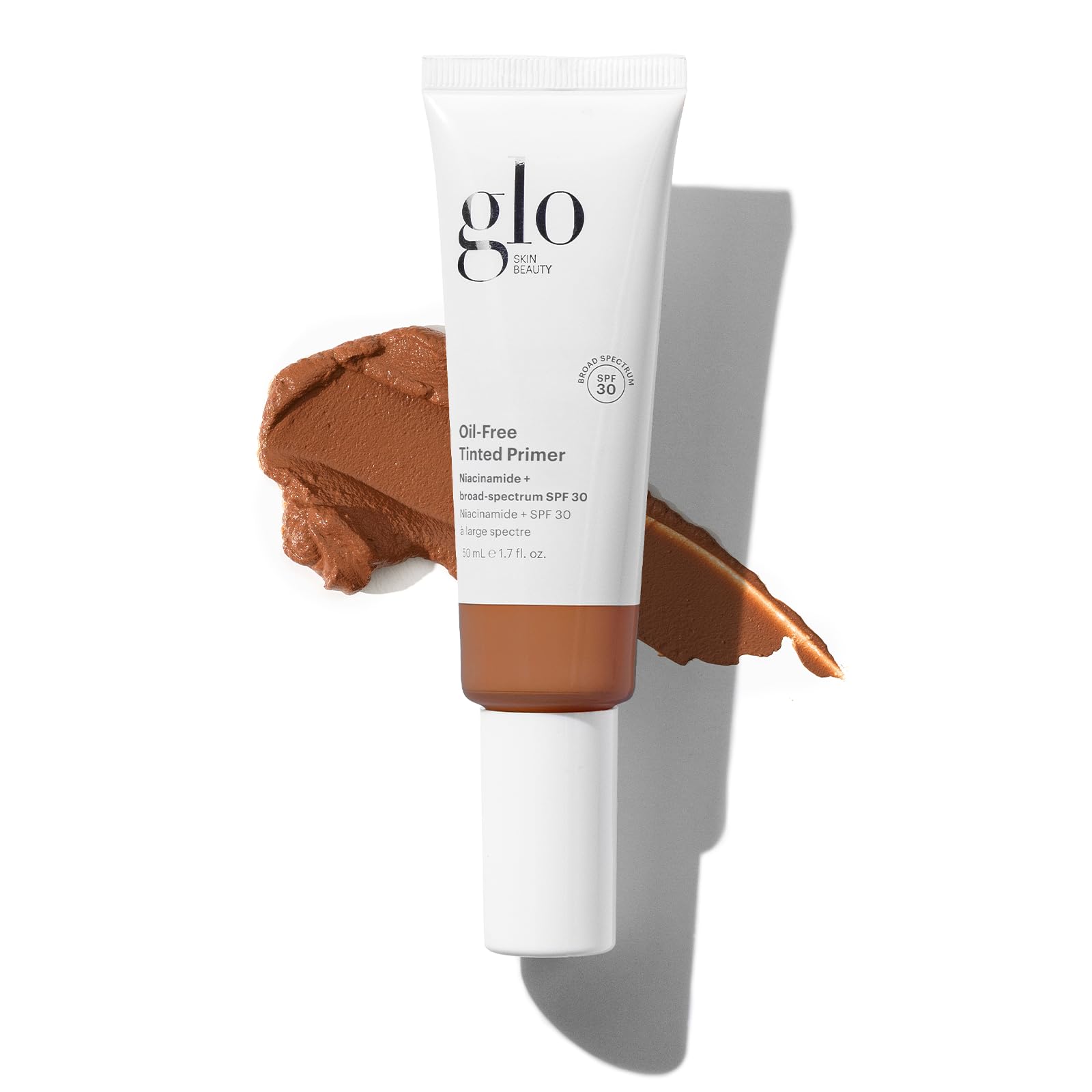 Glo Skin Beauty oil-free tinted primer deep bottle demonstrates light sun protection