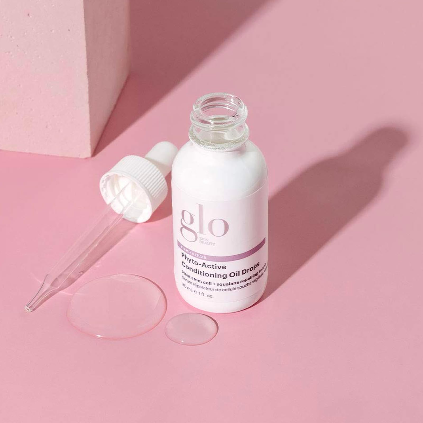 Glo Skin Beauty Phyto-Active Conditioning Oil Drops palm massage demo for nourishment.