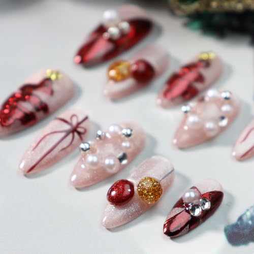 GLORS Christmas nails featuring red bow details for instant party-ready manicure.