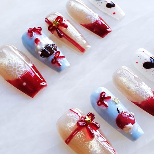 GLORS festive nails featuring snowflakes and hearts in red and blue