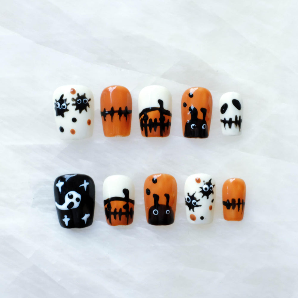 GLORS Halloween nails ghost and pumpkin design for festive party styling