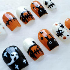 GLORS Halloween nails with stars and drips for playful autumn charm