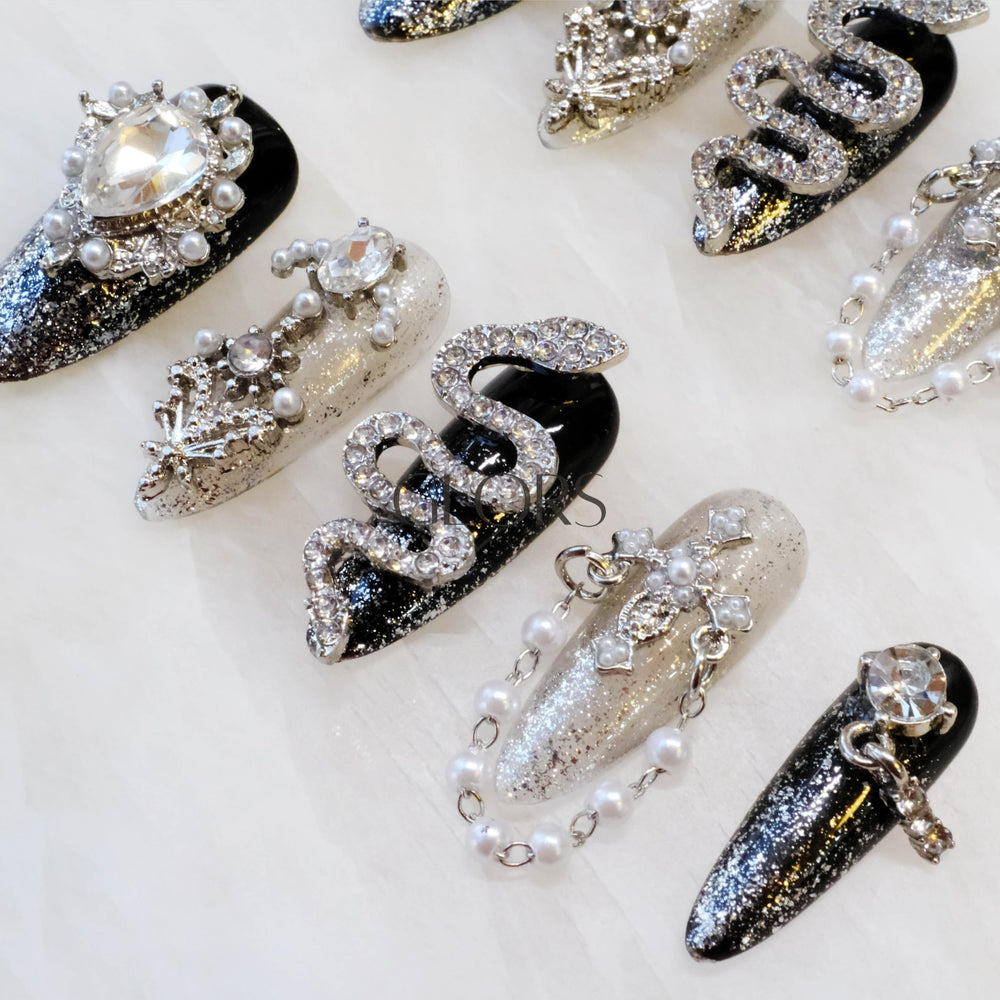 GLORS rhinestone-rich nails sparkle under lights for everyday luxe.