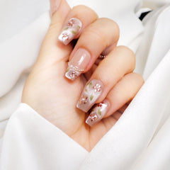 GLORS Medium Ballerina nails in nude pink with rose gold foil for elegant events