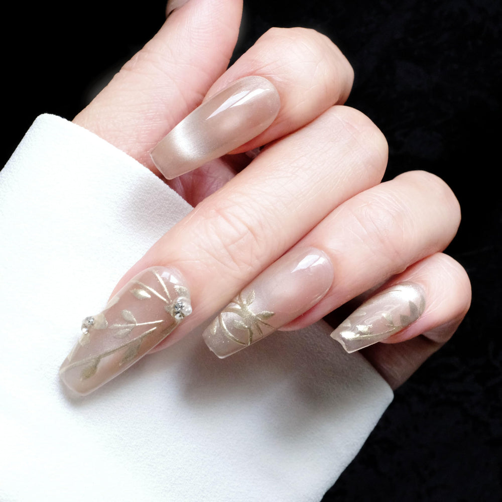Shiny nude finish on GLORS nails highlights a premium salon-quality look
